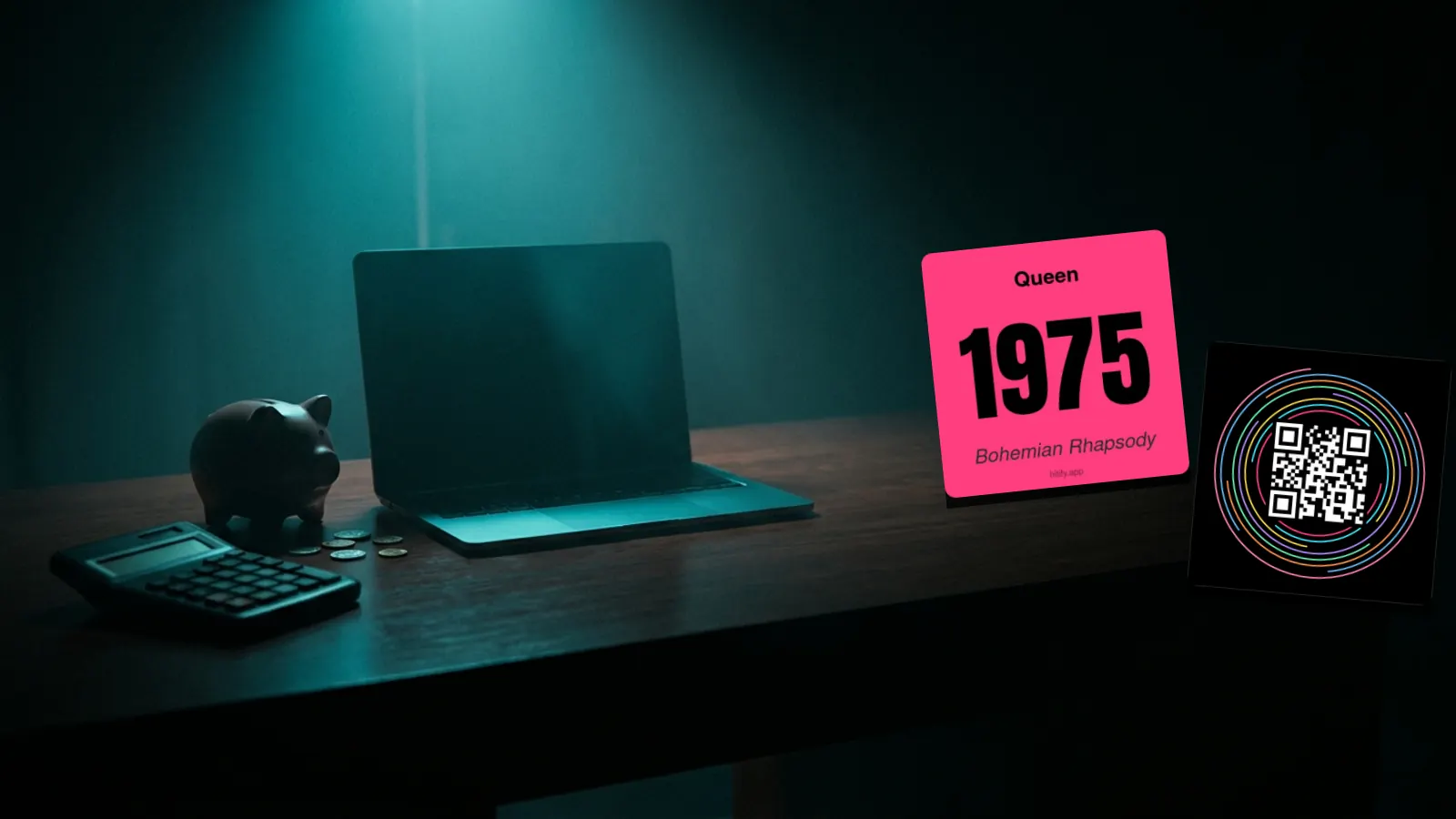 Hitify music cards, a laptop and a printer on a dark desk: Is DIY Hitster Worth It? Making Your Own vs. Buying the Game